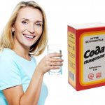 Woman with glass of bicarbonate solution